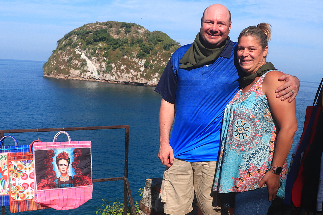 Couple Relaxing on the Beach, Travel to Puerto Vallarta for Fun and Relaxation by the Sea