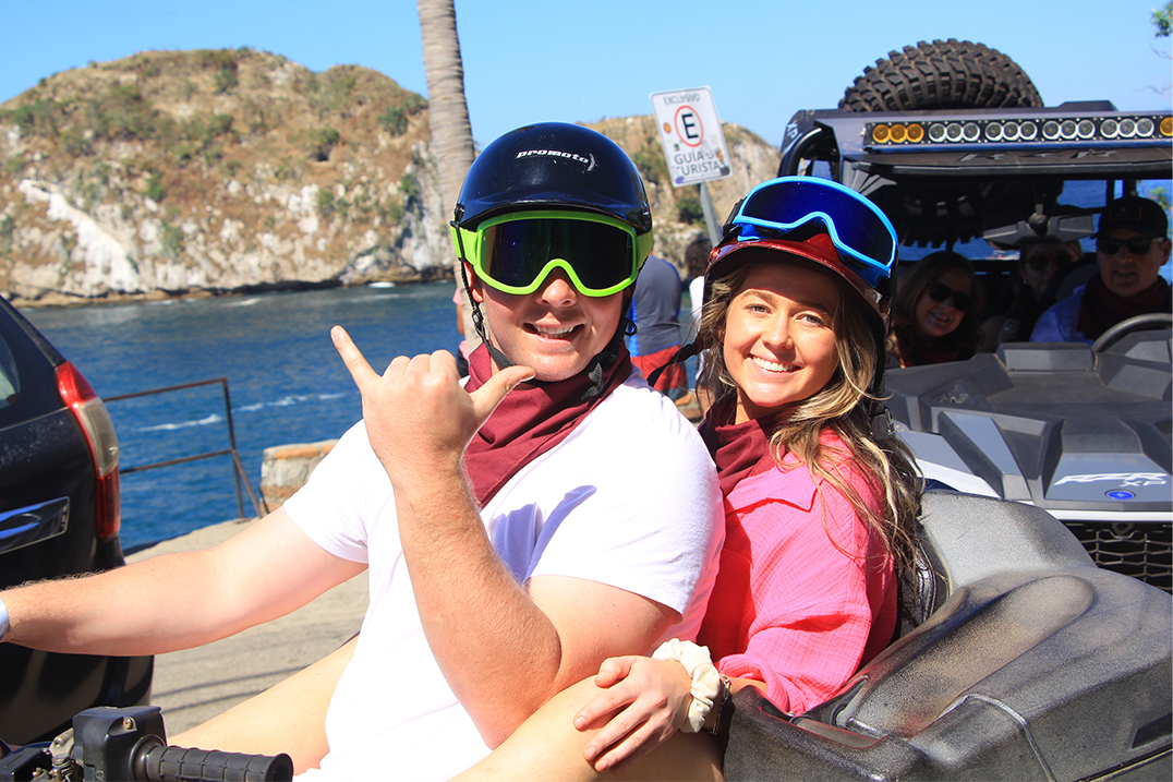 Tourists posing in Puerto Vallarta, capturing the excitement of adventures in Puerto Vallarta and scenic views.