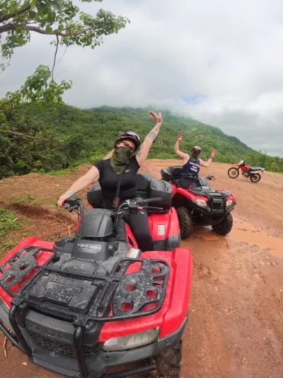 A person enjoying an adrenaline-filled ATV ride, a thrilling experience offered by adventure tourism companies in Puerto Vallarta.
