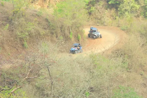 Riders conquering off-road trails in Puerto Vallarta on their ATVs, perfect for thrill-seekers and adventure lovers.