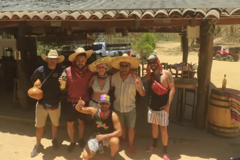 A Group Of Friends Enjoys A Rustic Stop In The Countryside, One Of The Best Day Trips From Puerto Vallarta For Adventure Seekers Looking For Authentic Local Experiences.