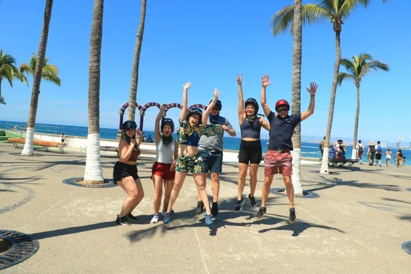 A group enjoys the sun and the energy of the sea, capturing the excitement and active spirit of Extreme adventures.