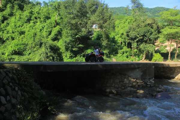 Driving an RZR along rural paths and natural bridges is one of the most thrilling Things to do in Hot Springs.