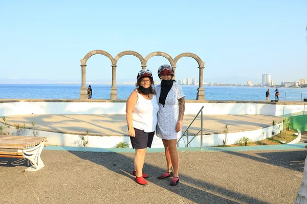 A trip to the waterfall tour with two happy friends, exploring landscapes, sharing laughter, connection, and memorable experiences.